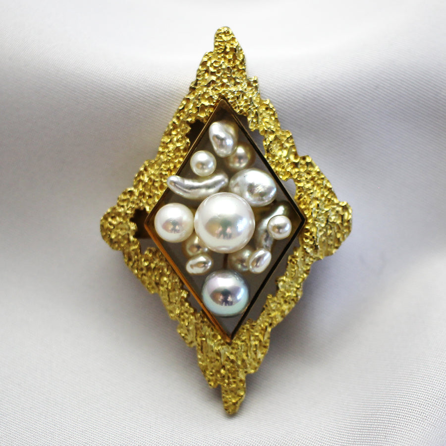world of boxes brooch