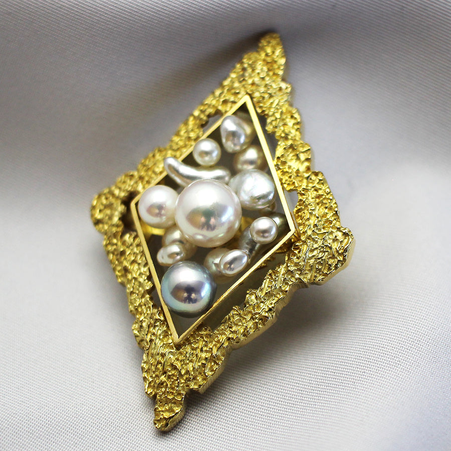 world of boxes brooch